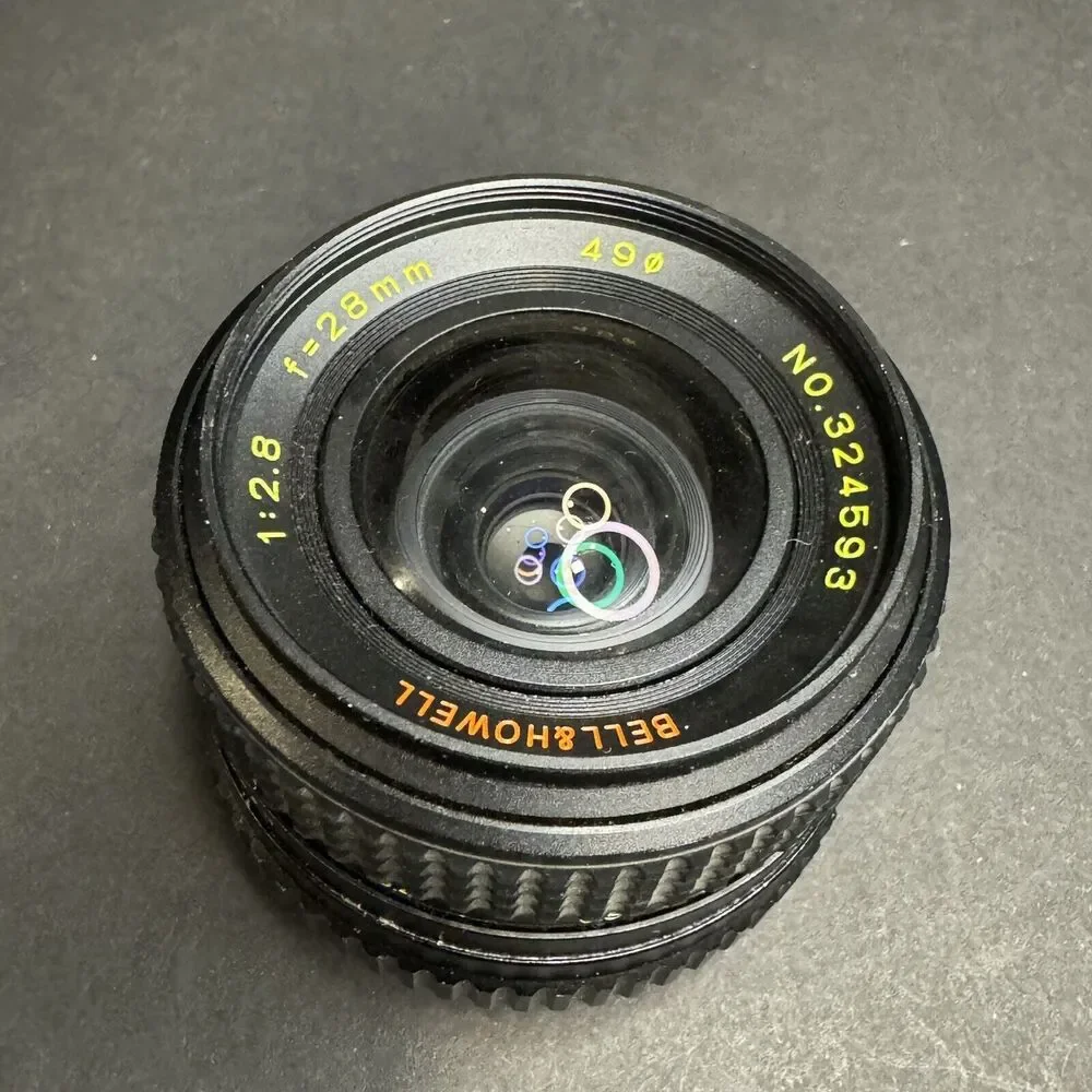 Bell and Howell 28mm F2.8 Prime Lens Minolta M/MD with Caps and Manual